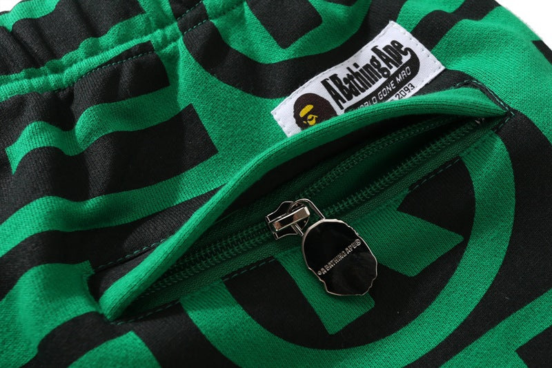 BAPE All over letter print sweatpants